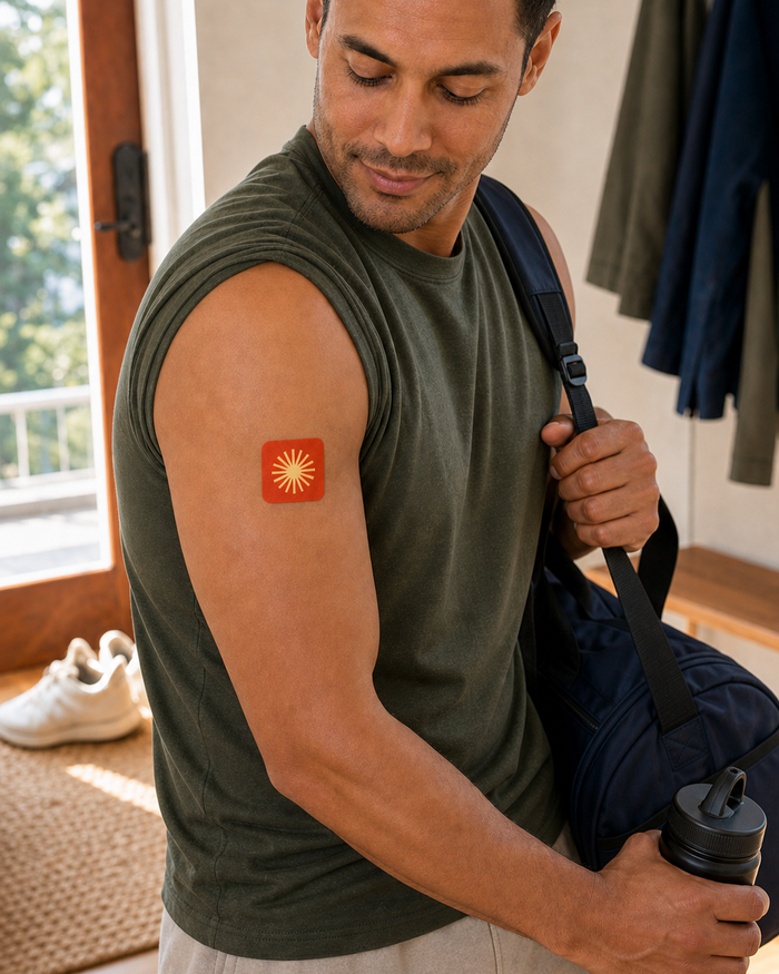 The same man wearing an Energy Patch while heading into his daytime routine